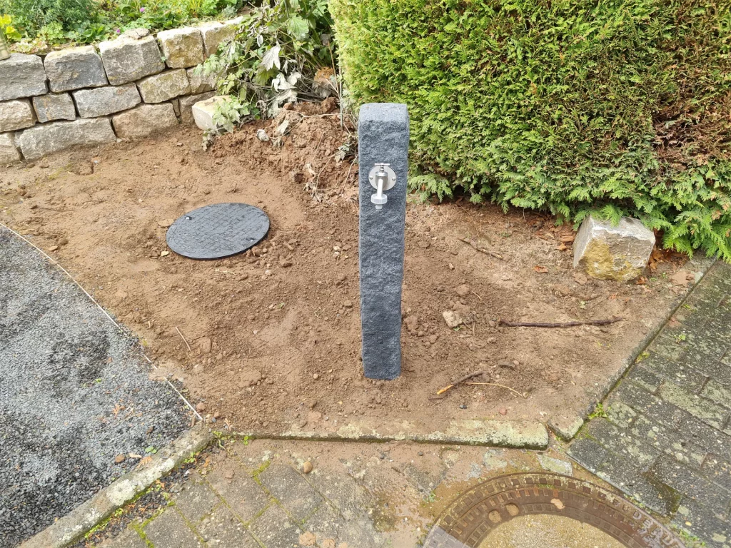 Brunnenanlage Zapfstelle Steinoptik